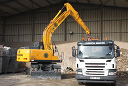 Skip Hire in Chelmsford unloading a lorry